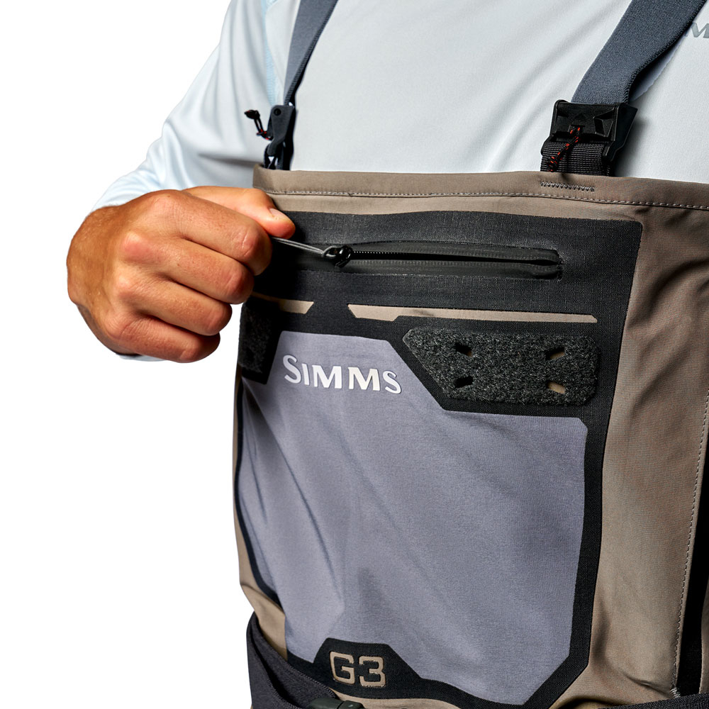 Two top-access chest stretch storage pockets perfect for most thin fly boxes with docking stations